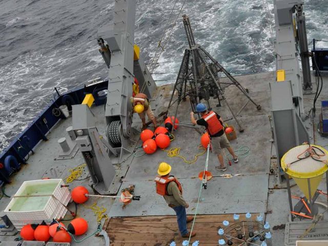 Depolying sediment traps. Credit: Alyson Santoro